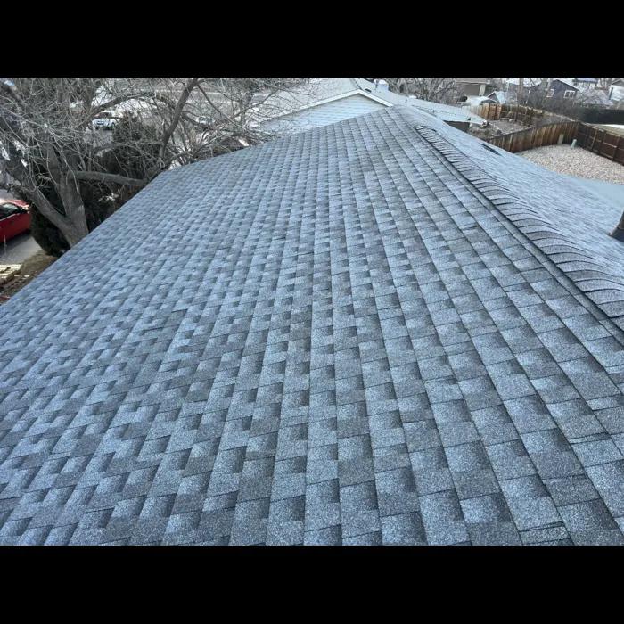 Gray architectural asphalt shingle roof after installation, photographed from the rooftop